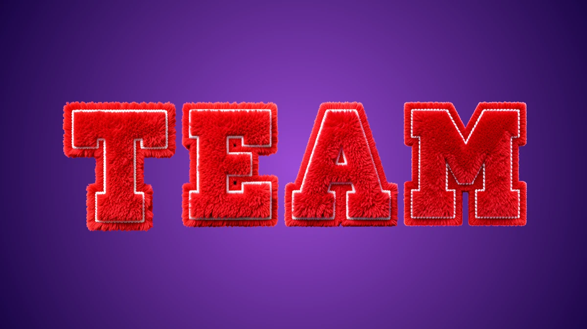 Flauschiger 3D-Text aus rotem Pelz mit weißer Stich in Sportkolleg-Stil