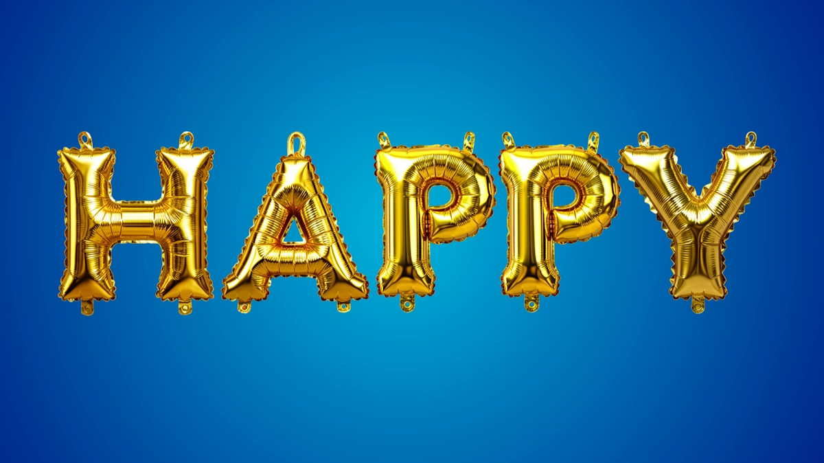 Festlicher 3D-Text aus goldenen Folgenschalen: aufgeblasene Buchstaben