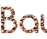 Online-Namenkonstruktor: Text aus Kaffeebohnen auf schönem Hintergrund - Schriftart Comfortaa